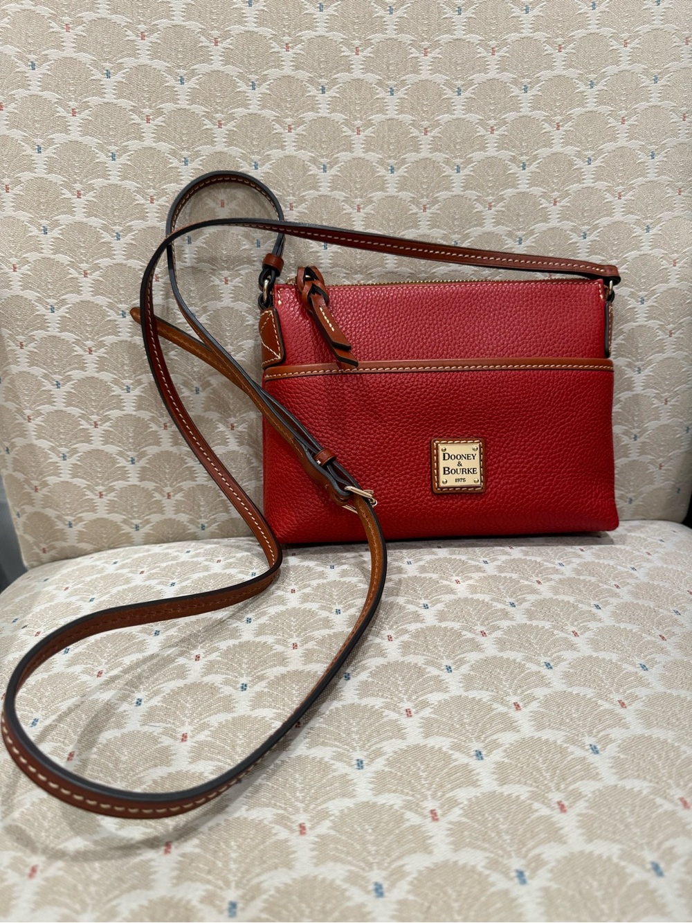 Dooney & Bourke Red Pebbled Leather Crossbody with Brown Trim
